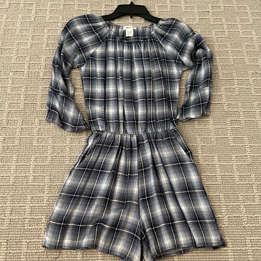 Are code 407 girls long sleeve plaid romper with pockets size 14.  Never worn